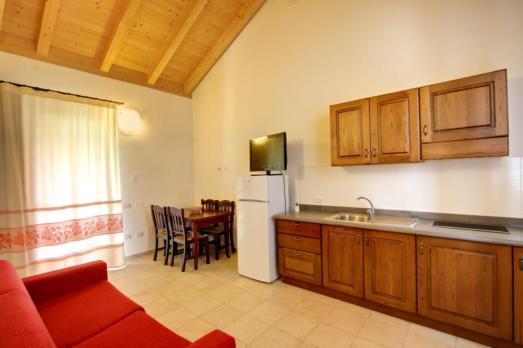 La Corte Dei Rei Aparthotel Castiadas Habitación foto