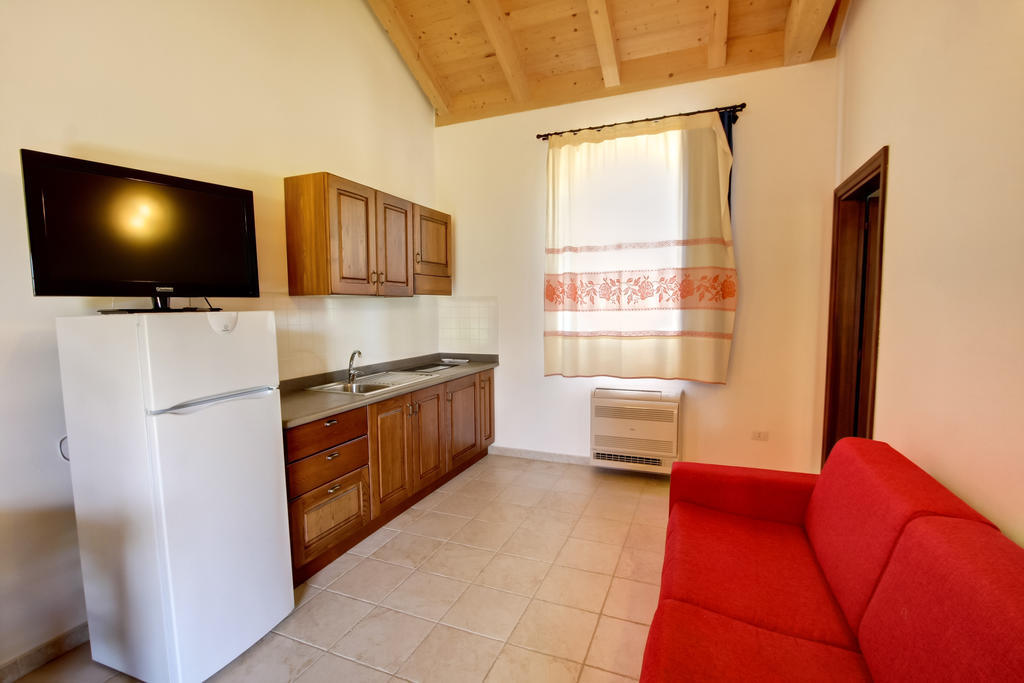 La Corte Dei Rei Aparthotel Castiadas Habitación foto